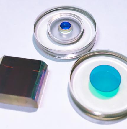 Moated ring laser gyro mirrors